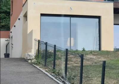Façade de l’extension terminée avec baie vitrée