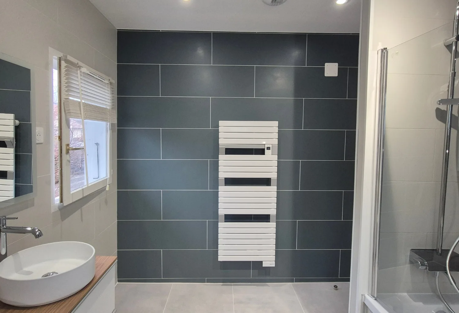 Installation sèche serviette à Thoiry