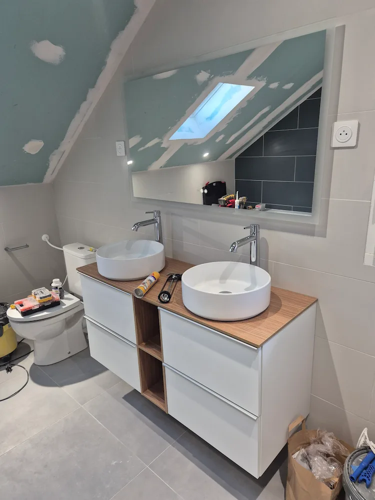 Pose meuble vasque pour rénovation salle de bain à Thoiry